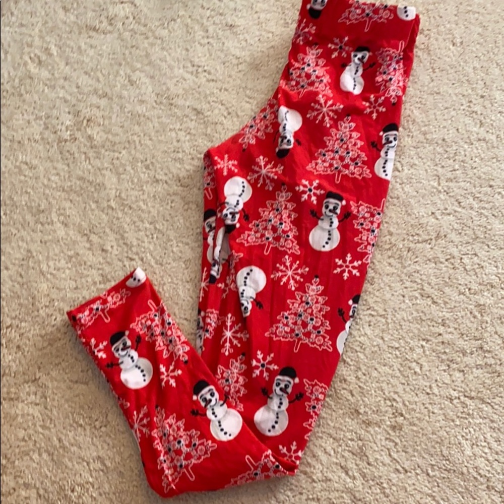 Snowman patterned red leggings